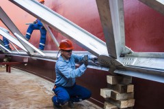 worker take care of dome roof component